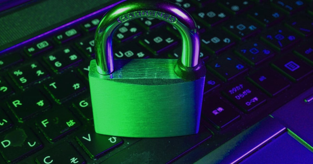 red padlock on black computer keyboard